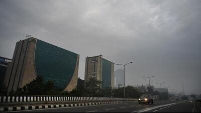 Dark rain clouds hover low over the Noida skyline on Tuesday. The minimum and maximum temperature in Gautam Budh Nagar on Tuesday was recorded 15.4 and 24.0 degrees Celsius, respectively. (Sunil Ghosh/HT Photo) Dark rain clouds hover low over the Noida skyline on Tuesday. The minimum and maximum temperature in Gautam Budh Nagar on Tuesday was recorded 15.4 and 24.0 degrees Celsius, respectively. (Sunil Ghosh/HT Photo)