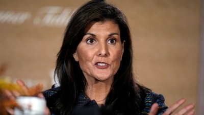 FILE - Republican presidential candidate former U.N. Ambassador Nikki Haley speaks during the Family Leader's Thanksgiving Family Forum, Nov. 17, 2023, in Des Moines, Iowa. Former President Donald Trump plans to use a college football rivalry weekend to bask among his supporters in South Carolina, while potentially upstaging his Republican opponent Nikki Haley on her home turf. The front-runner for the 2024 Republican nomination will be on hand Saturday as the University of South Carolina Gamecocks host the Tigers of Clemson University in the annual Palmetto Bowl. (AP Photo/Charlie Neibergall, File) (AP) FILE - Republican presidential candidate former U.N. Ambassador Nikki Haley speaks during the Family Leader's Thanksgiving Family Forum, Nov. 17, 2023, in Des Moines, Iowa. Former President Donald Trump plans to use a college football rivalry weekend to bask among his supporters in South Carolina, while potentially upstaging his Republican opponent Nikki Haley on her home turf. The front-runner for the 2024 Republican nomination will be on hand Saturday as the University of South Carolina Gamecocks host the Tigers of Clemson University in the annual Palmetto Bowl. (AP Photo/Charlie Neibergall, File) (AP)