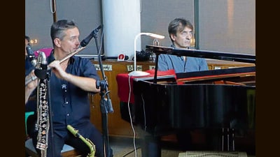 French musicians, pianist Robert Piéchaud and saxophonist Stan de Nussac performing in the city
