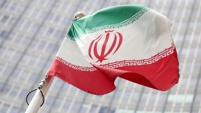 Iran's sports minister has sacked the country's deaf sports federation chief after pictures emerged of a foreign woman athlete without a compulsory headscarf at a tournament, local media said. (Reuters)