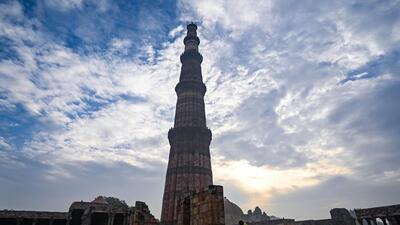 New Delhi, India - Nov. 28, 2023: Clouds seen hovering over the skies on a cold morning at Qutub Minar in New Delhi, India, on Tuesday, November 28, 2023. (Photo by Sanchit Khanna/ Hindustan Times) (Hindustan Times)
