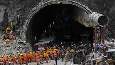 Rescuers near the face of the collapsed under construction Silkyara tunnel. (AFP) Rescuers near the face of the collapsed under construction Silkyara tunnel. (AFP)