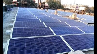 Rooftop solar power plant atop an NCR building. (HT file) Rooftop solar power plant atop an NCR building. (HT file)