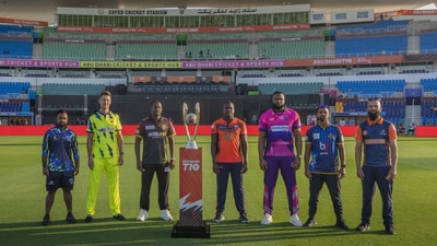 The captains pose with the Abu Dhabi T10 League trophy The captains pose with the Abu Dhabi T10 League trophy