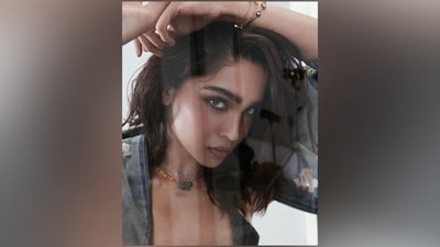 Sharvari wore a dark blue denim bralette featuring a fitted bust, a halter neckline, a backless design, a plunging front flaunting her decolletage, and a super cropped hem highlighting her toned abs. (Instagram) Sharvari wore a dark blue denim bralette featuring a fitted bust, a halter neckline, a backless design, a plunging front flaunting her decolletage, and a super cropped hem highlighting her toned abs. (Instagram)
