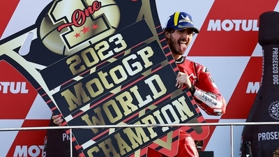 Ducati Italian rider Francesco Bagnaia celebrates on the podium after winning the MotoGP Valencia Grand Prix (AFP) Ducati Italian rider Francesco Bagnaia celebrates on the podium after winning the MotoGP Valencia Grand Prix (AFP)