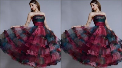 Her gorgeous dress is by Gauri and Nainika and features an off-shoulder neckline, a fitted waist, a flared bottoms with multiple ruffles adorning it and an all over print in shades of pink, blue and green adding to the chic factor. (Instagram/@khushi05k) Her gorgeous dress is by Gauri and Nainika and features an off-shoulder neckline, a fitted waist, a flared bottoms with multiple ruffles adorning it and an all over print in shades of pink, blue and green adding to the chic factor. (Instagram/@khushi05k)