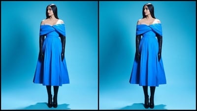 Her off shoulder dress comes in an enchanting shade of ocean blue and features large bow embellishments at the neckline, a concealed rear zip fastening, short sleeves, a fitted waist, a flared bottom and a midi hemline, (Instagram/@sonamkapoor) Her off shoulder dress comes in an enchanting shade of ocean blue and features large bow embellishments at the neckline, a concealed rear zip fastening, short sleeves, a fitted waist, a flared bottom and a midi hemline, (Instagram/@sonamkapoor)