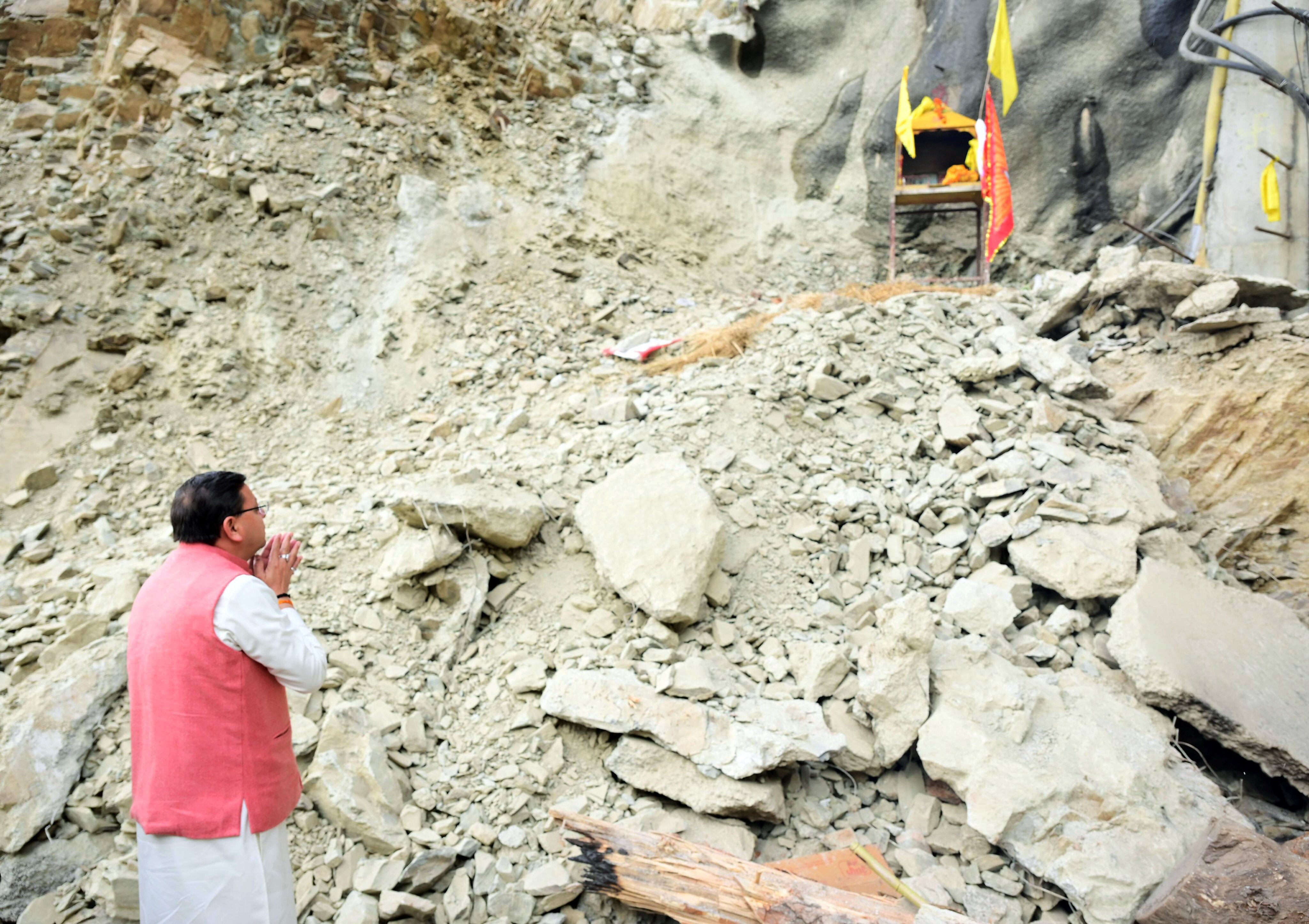Uttarkashi, Nov 28 (ANI): Uttrakhand Chief Minister Pushkar Singh Dhami prays at the Silkyara tunnel rescue operation site in Uttarkashi on Tuesday. (ANI Photo) (Pushkar Singh Dhami-X) Uttarkashi, Nov 28 (ANI): Uttrakhand Chief Minister Pushkar Singh Dhami prays at the Silkyara tunnel rescue operation site in Uttarkashi on Tuesday. (ANI Photo) (Pushkar Singh Dhami-X)
