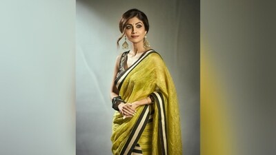 Styled by celebrity fashion stylist Sukriti Grover, Shilpa accessorised her look with a pair of golden statement earrings, black chunky stacked bangles adorning her wrist and a pair of high heels. (Instagram/@theshilpashetty) Styled by celebrity fashion stylist Sukriti Grover, Shilpa accessorised her look with a pair of golden statement earrings, black chunky stacked bangles adorning her wrist and a pair of high heels. (Instagram/@theshilpashetty)