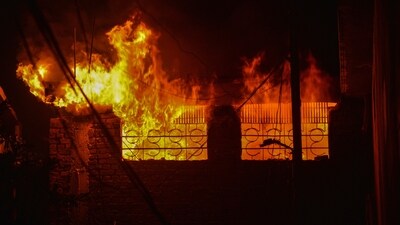 Smoke and flames billow from plastic godown where the fire broke out. (HT File)