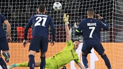 Kylian Mbappe converted the spot kick in the last minute of stoppage time after a controversial penalty was awarded to PSG (AFP) Kylian Mbappe converted the spot kick in the last minute of stoppage time after a controversial penalty was awarded to PSG (AFP)