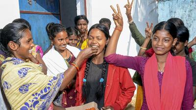 Family members of Sukram Bediya and Naresh Bediya, who were rescued from the tunnel on Tuesday, celebrate at Khirabera village in Ranchi district on Wednesday. (PTI) Family members of Sukram Bediya and Naresh Bediya, who were rescued from the tunnel on Tuesday, celebrate at Khirabera village in Ranchi district on Wednesday. (PTI)