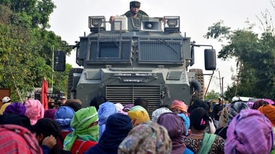 Residents from Meitei community stop an army vehicle from moving towards a gunfight site after a fresh clash between members of rival ethnic groups, in Imphal, Manipur, India, November 7, 2023. (Reuters)