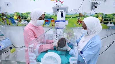 A premature Palestinian baby evacuated from Gaza is pictured inside an ambulance on the Egyptian side of the Rafah border crossing with the Gaza Strip, on November 20, 2023. (AFP) A premature Palestinian baby evacuated from Gaza is pictured inside an ambulance on the Egyptian side of the Rafah border crossing with the Gaza Strip, on November 20, 2023. (AFP)