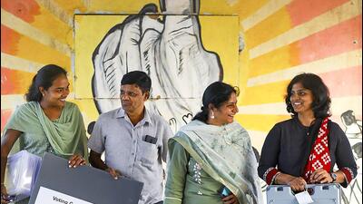 Polling officials carrying EVMs and other polling materials leave for their respective booths on the eve of the Telangana assembly election, in Hyderabad (PTI) Polling officials carrying EVMs and other polling materials leave for their respective booths on the eve of the Telangana assembly election, in Hyderabad (PTI)
