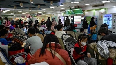 In recent days, many hospital waiting rooms in parts of China have been full of worried parents waiting hours or even days in long lines to see a doctor. (Jade Gao/AFP ) In recent days, many hospital waiting rooms in parts of China have been full of worried parents waiting hours or even days in long lines to see a doctor. (Jade Gao/AFP )