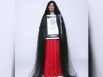 Smita Srivastava holding Guinness World Records certificate. 