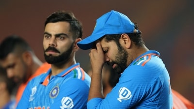 India's Virat Kohli and Rohit Sharma look dejected after losing the ICC Cricket World Cup final (REUTERS)