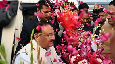 Party workers welcome BJP national president JP Nadda at the DND Flyway with floral showers on Thursday. (Sunil Ghosh/HT Photo) Party workers welcome BJP national president JP Nadda at the DND Flyway with floral showers on Thursday. (Sunil Ghosh/HT Photo)