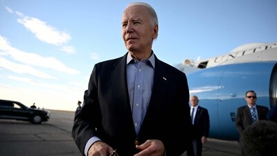 US President Joe Biden speaks to reporters before boarding Air Force One at Pueblo Memorial Airport in Pueblo, Colorado, on November 29, 2023. (Photo by ANDREW CABALLERO-REYNOLDS / AFP) (AFP)