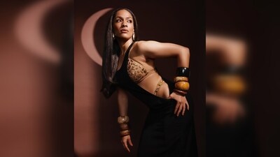 Masaba Gupta unveiled the 'IDGAF' dress from her collection, pairing it with lingerie in a biscuit hue for a chic ensemble. (Instagram/@masabagupta) Masaba Gupta unveiled the 'IDGAF' dress from her collection, pairing it with lingerie in a biscuit hue for a chic ensemble. (Instagram/@masabagupta)
