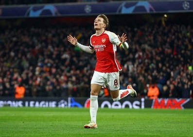 Arsenal's Martin Odegaard celebrates scoring a goal. (Action Images via Reuters)