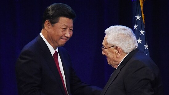 Chinese President Xi Jinping is greeted by former US Secretary of State Henry Kissinger during his welcoming banquet at the start of his visit to the United States, at the Westin Hotel in Seattle, Washington in 2015.&nbsp;(AFP)