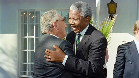 African National Congress President Nelson Mandela with former US Secretary of State Henry Kissinger upon his arrival in 1994 in Johannesburg.&nbsp;(AFP)