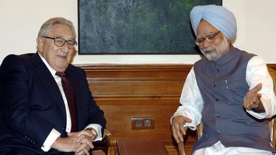 Former Indian Prime Minister Manmohan Singh in discussion with with former US Secretary of State Henry Kissinger during a meeting at Singh's residence in New Delhi in 2004.&nbsp;(AFP)