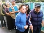 An elderly voter being assisted on his arrival to cast his vote for the Mizoram assembly elections, at a polling station, in Aizawl.
An elderly voter being assisted on his arrival to cast his vote for the Mizoram assembly elections, at a polling station, in Aizawl.