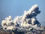 This picture taken from southern Israel near the border with the Gaza Strip shows smoke rising from buildings after being hit by Israeli strikes, as battles resume between Israel and Hamas militants. This picture taken from southern Israel near the border with the Gaza Strip shows smoke rising from buildings after being hit by Israeli strikes, as battles resume between Israel and Hamas militants.