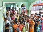 Voters wait in queues at a polling station to cast their votes for Telangana Assembly elections.(HT File Photo)
