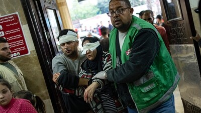 Israel-Hamas War: Palestinians wounded in Israeli bombardment of the Gaza Strip are brought to a hospital in Khan Younis. (AP) Israel-Hamas War: Palestinians wounded in Israeli bombardment of the Gaza Strip are brought to a hospital in Khan Younis. (AP)