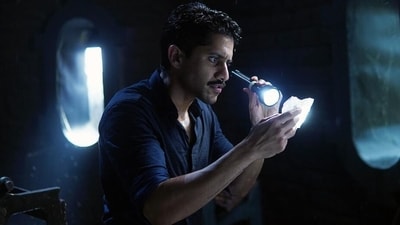 Dhootha review: Naga Chaitanya in a still from Dhootha Dhootha review: Naga Chaitanya in a still from Dhootha