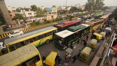 In the absence of a bus stand, all buses board and de-board passengers outside the Botanical Garden Metro station, on the main Dadri Road, causing traffic congestion. (HT Archive) In the absence of a bus stand, all buses board and de-board passengers outside the Botanical Garden Metro station, on the main Dadri Road, causing traffic congestion. (HT Archive)