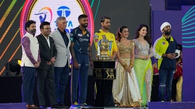 The IPL 2023 opening ceremony ended with MS Dhoni and Hardik Pandya coming to the stage in chariots and then posing for a photograph with the IPL trophy, alongwith Jay Shah, Arun Dhumal and the performers. (AP) The IPL 2023 opening ceremony ended with MS Dhoni and Hardik Pandya coming to the stage in chariots and then posing for a photograph with the IPL trophy, alongwith Jay Shah, Arun Dhumal and the performers. (AP)