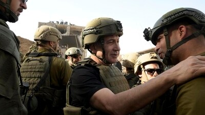 Israel's Prime Minister Benjamin Netanyahu greets soldiers as he visits the Gaza Strip. (AP)