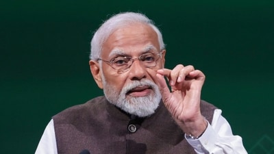Dubai: Prime Minister Narendra Modi speaks at a high-level event on Green Credits Programme during the COP28, in UAE, Friday, Dec. 1, 2023. (PTI) Dubai: Prime Minister Narendra Modi speaks at a high-level event on Green Credits Programme during the COP28, in UAE, Friday, Dec. 1, 2023. (PTI)