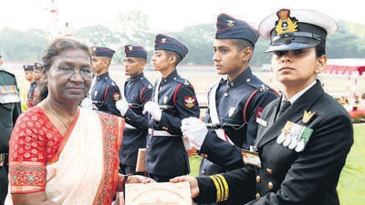 President Droupadi Murmu distributes certificate to a cadet during the Passing Out Parade of 145th Course of the National Defence Academy (NDA) at Khadakwasla, in Pune, Thursday. (PTI)