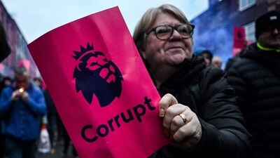 Everton's supporters protest over the club's 10-point punishment for breaching financial regulation (AFP) Everton's supporters protest over the club's 10-point punishment for breaching financial regulation (AFP)