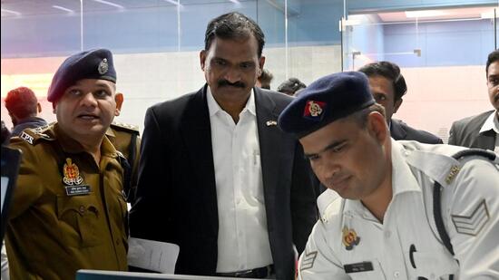 Additional DGP, traffic and road safety, Badugu Deva Paulson (centre) inspects the intelligent traffic management system at the control room in Sector 94, Noida, on Friday. (Sunil Ghosh /HT Photo)