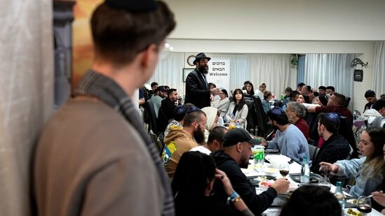 Cyprus' Chief Rabbi Arie Zeev Raskin addresses young people who attended a retreat in Cyprus to help them cope with the psychological trauma they suffered from the October 7 attack by Hamas militants on a rave party in southern Israel. (AP)