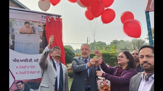 Health and family welfare minister Dr Balbir Singh while commemorating a World AIDS Day function at a state-level event in Ludhiana on Friday announced that the state government is poised to expand the coverage of ration card benefits by incorporating additional social factors like single mothers and individuals afflicted with HIV for eligibility. (HT Photo)