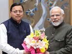 Uttarakhand CM Pushkar Singh Dhami with PM Narendra Modi