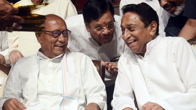Madhya Pradesh Congress President Kamal Nath with Rajya Sabha MP Digvijay Singh during the release of party's manifesto on October 17. Madhya Pradesh Congress President Kamal Nath with Rajya Sabha MP Digvijay Singh during the release of party's manifesto on October 17.