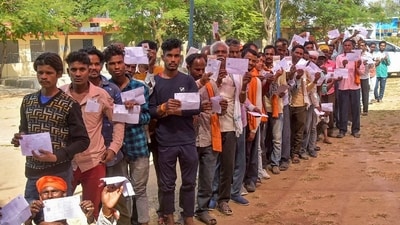 Voters queue up to cast their votes for the second phase of the Chhattisgarh Assembly elections, in Mandla district on November 17. (ANI) Voters queue up to cast their votes for the second phase of the Chhattisgarh Assembly elections, in Mandla district on November 17. (ANI)
