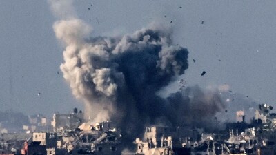 A picture taken from southern Israel near the border with the Gaza Strip on December 2, 2023, shows smoke billowing over the Palestinian territory during Israeli bombardment amid continuing battles between Israel and the militant group Hamas. Israel carried out deadly bombardments in Gaza for a second day on December 2 after a week-long truce with Hamas collapsed despite international calls for an extension. (Photo by JACK GUEZ / AFP) (AFP) A picture taken from southern Israel near the border with the Gaza Strip on December 2, 2023, shows smoke billowing over the Palestinian territory during Israeli bombardment amid continuing battles between Israel and the militant group Hamas. Israel carried out deadly bombardments in Gaza for a second day on December 2 after a week-long truce with Hamas collapsed despite international calls for an extension. (Photo by JACK GUEZ / AFP) (AFP)