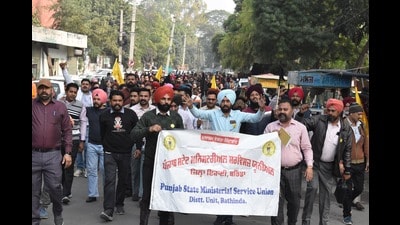 Members of the Punjab State Ministerial Service Union holding a protest in Bathinda on Saturday. (Sanjeev Kumar/HT) Members of the Punjab State Ministerial Service Union holding a protest in Bathinda on Saturday. (Sanjeev Kumar/HT)