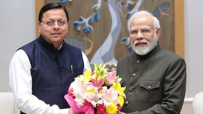 Uttarakhand CM Pushkar Singh Dhami with PM Narendra Modi Uttarakhand CM Pushkar Singh Dhami with PM Narendra Modi